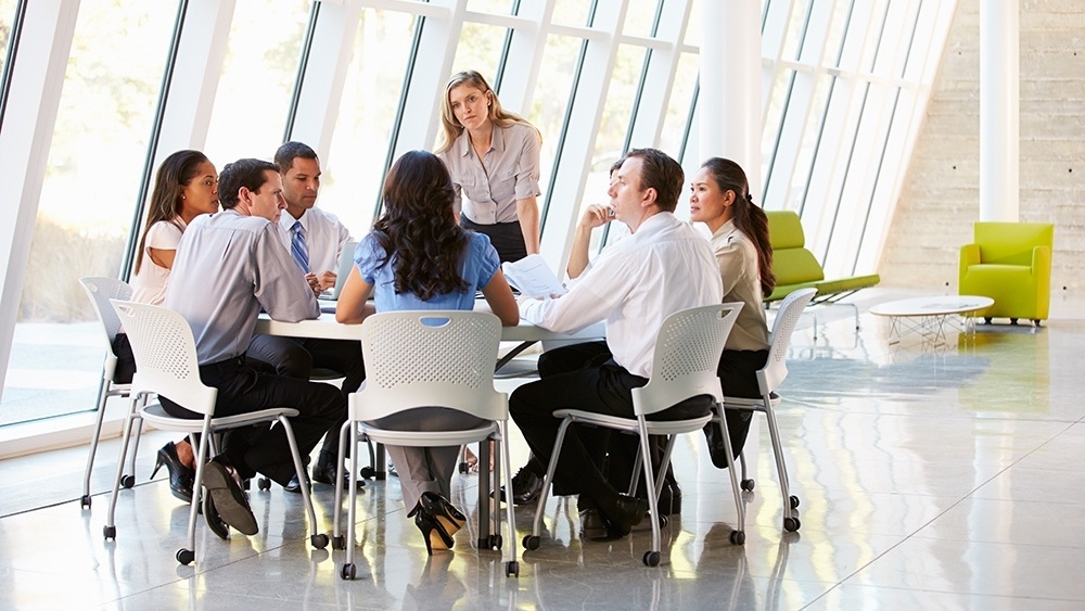 WEB - Business People Having Board Meeting In Office-885557-edited